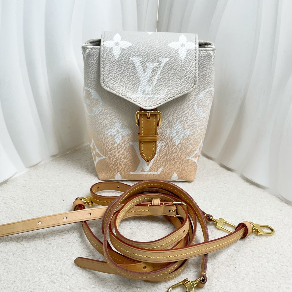 Louis Vuitton Pink and White Backpack with Monogram Design
